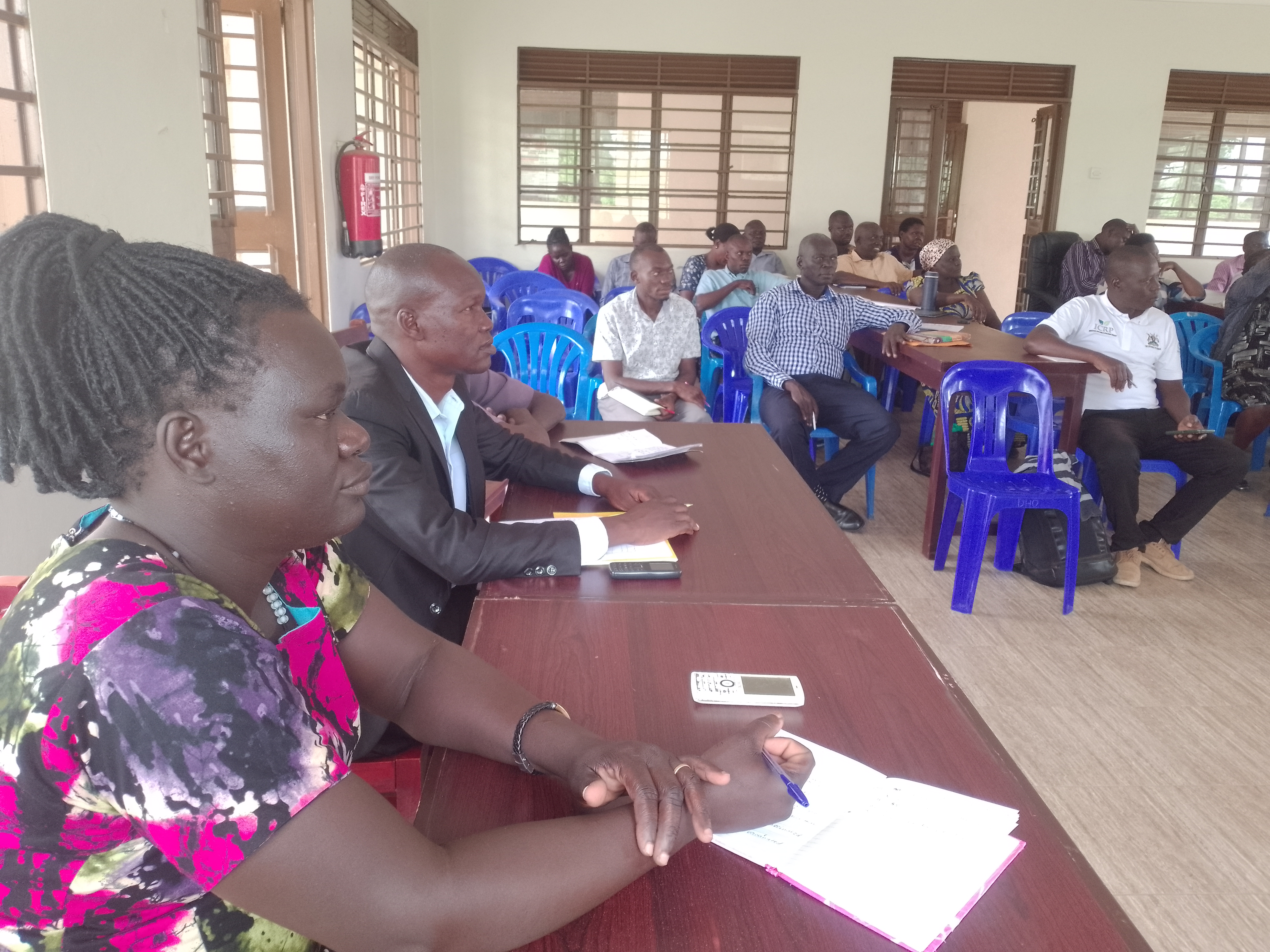 The district holders attending a meeting at the district hall