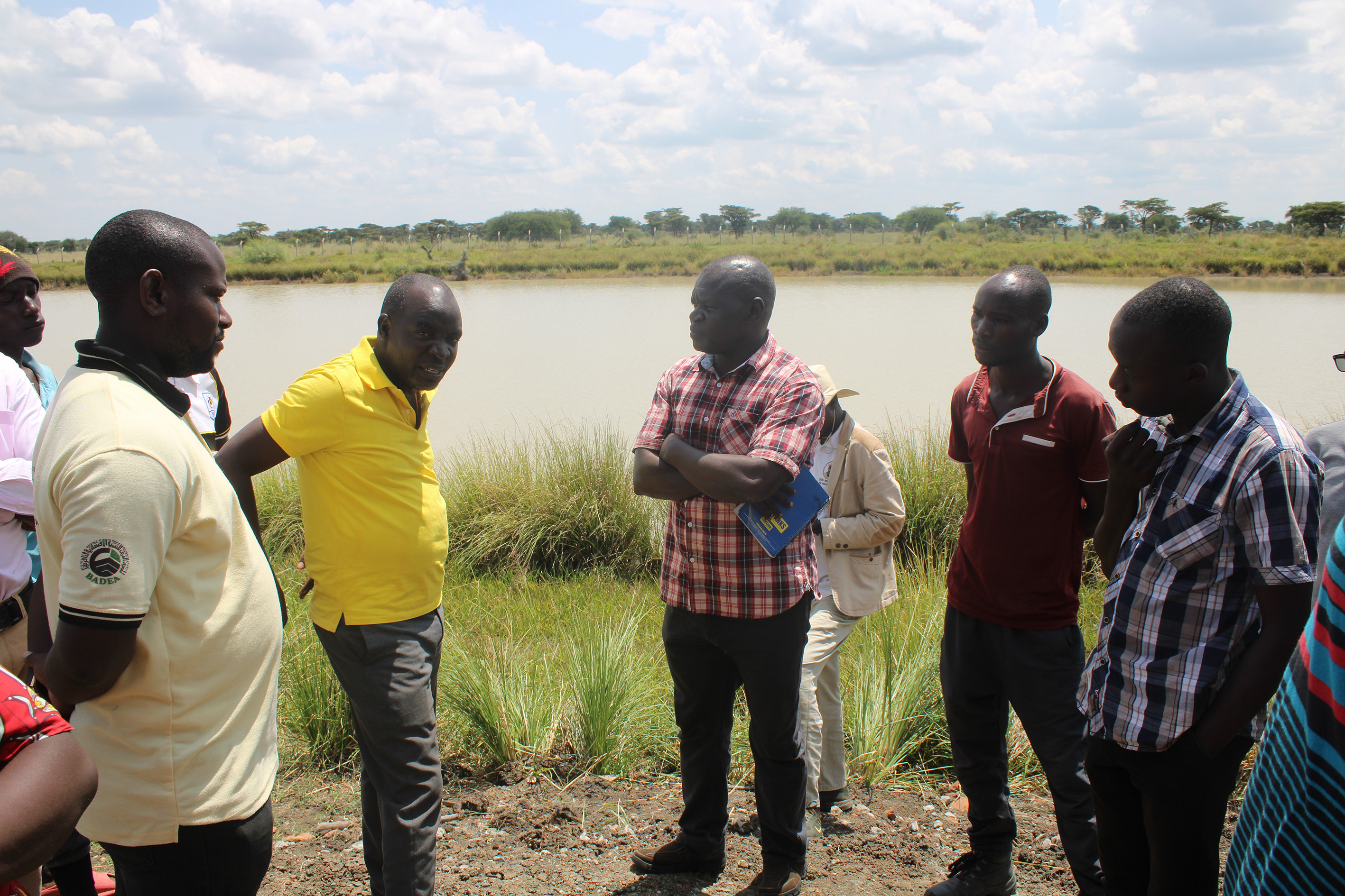 Eng. Patrick Okotel, Regional Manager water for production and Francis Akorikin, Kapelebyong District Chairperson inspecting the valley tank before commissioning on Wednesday.jpg