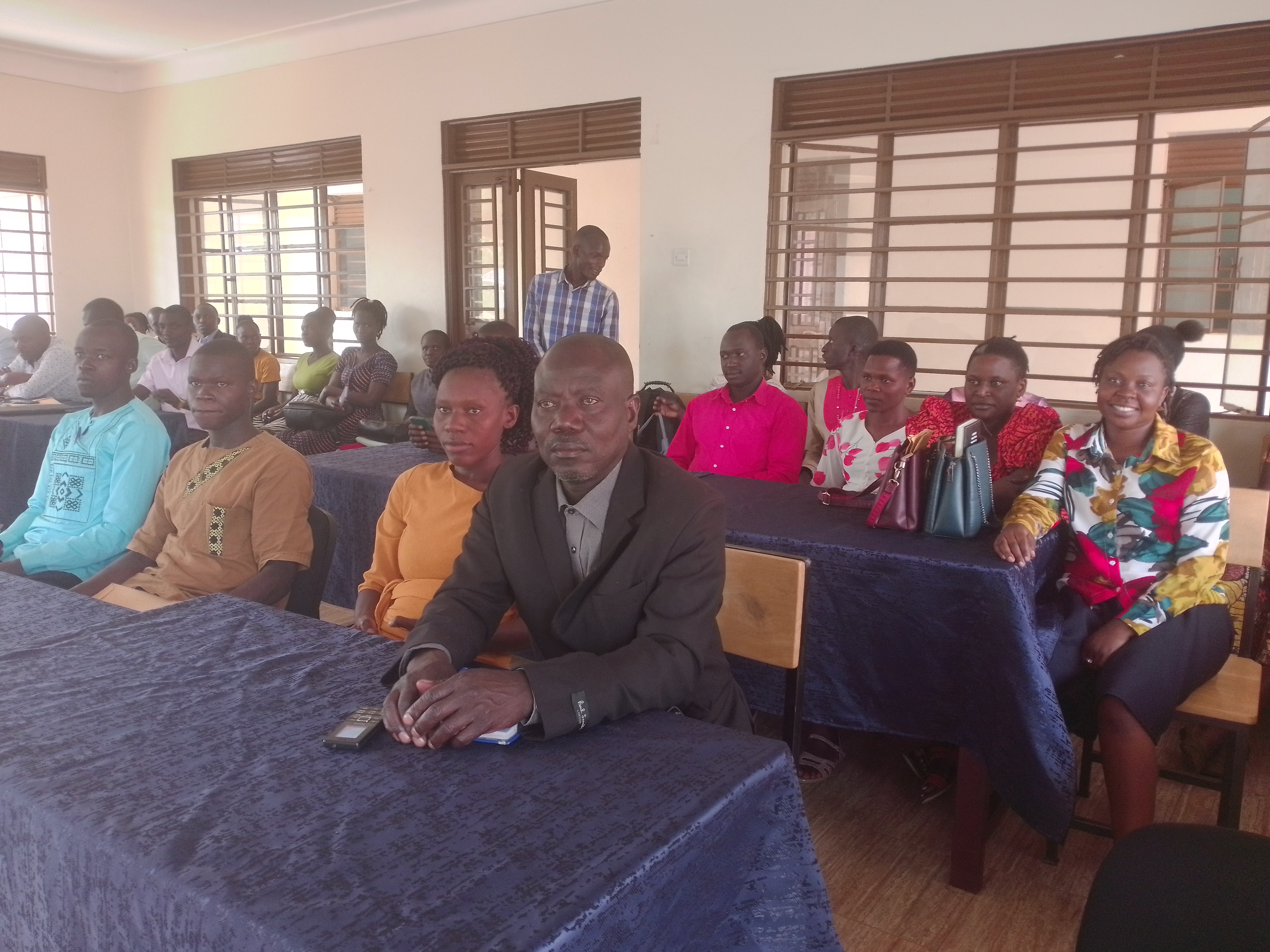 The newly recruited employees waiting to take oath in the district council hall on Wednesday. Photo by Emmanuel Opio